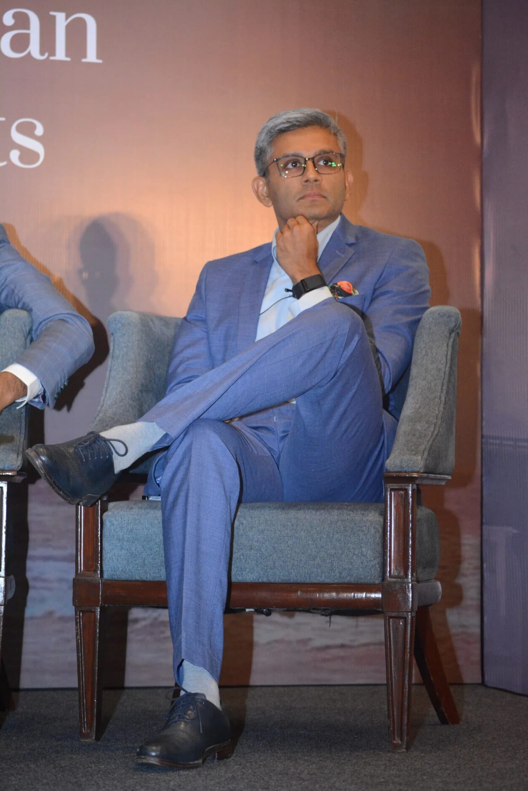Conference speaker at podium 14