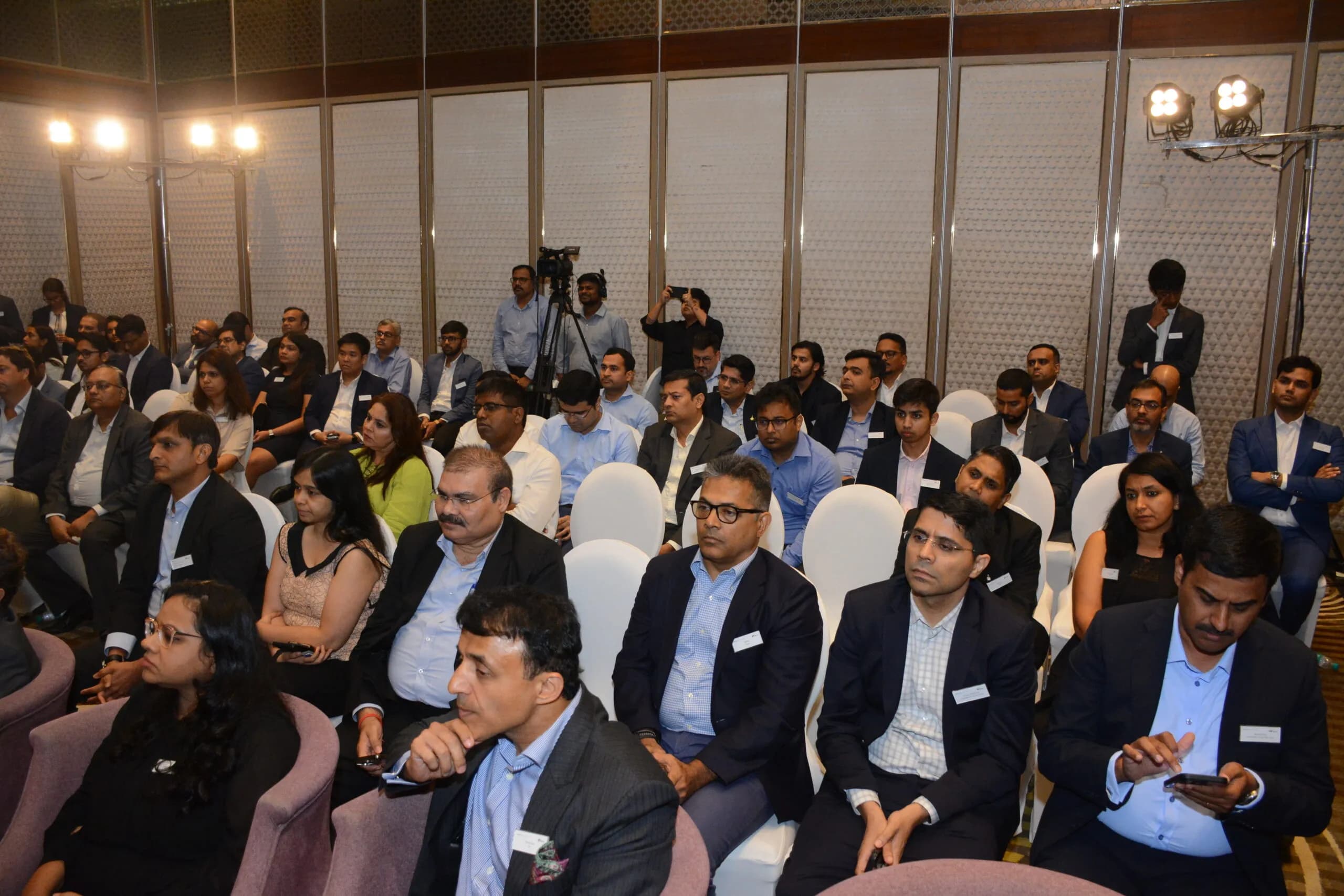 Conference speaker at podium 27